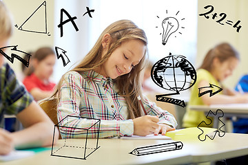 Image showing group of school kids writing test in classroom