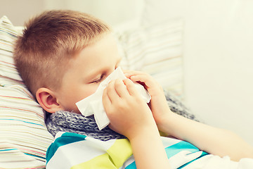 Image showing ill boy with flu at home