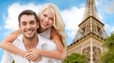 Image showing happy couple having fun over eiffel tower