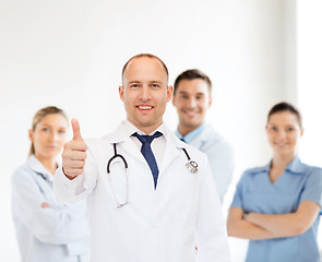 Image showing smiling male doctor with stethoscope