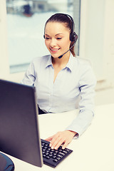 Image showing friendly female helpline operator