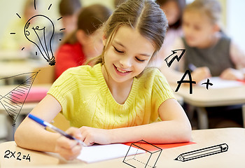 Image showing group of school kids writing test in classroom