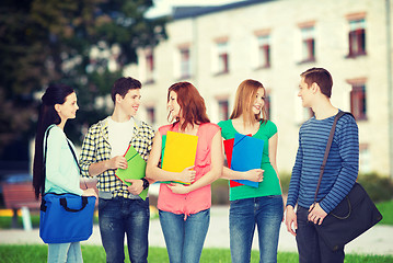 Image showing group of smiling students standing