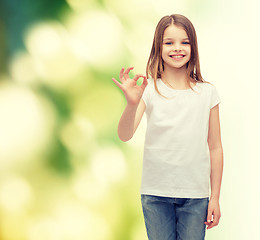 Image showing little girl in white t-shirt showing ok gesture