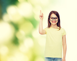 Image showing smiling cute little girl in black eyeglasses