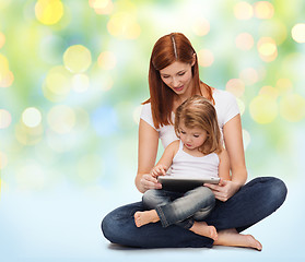 Image showing happy mother with little girl and tablet pc