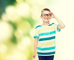 Image showing smiling little boy in eyeglasses