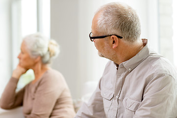 Image showing senior couple sitting on sofa at home