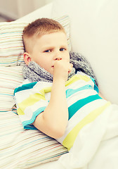 Image showing ill boy with flu at home