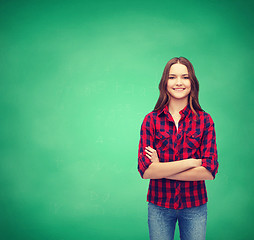 Image showing smiling young woman in casual clothes