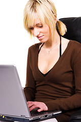 Image showing young woman working on computer