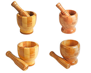 Image showing Wooden mortar and pestle. Set.