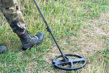 Image showing Search for treasure with metal detectors.