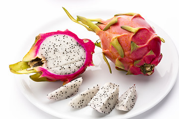 Image showing Pitaya, Whole, Halved And Cut Into Fruit Wedges