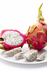 Image showing Pitaya And Its Fruit Flesh On A White Plate