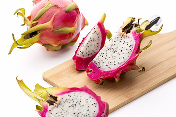 Image showing Cut Pitaya Pieces On A Wooden Cutting Board