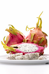 Image showing Fruit Pulp Of The Strawberry Pear On A White Plate