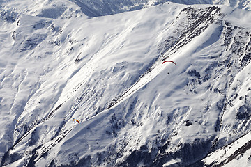 Image showing Paragliders of snowy mountains