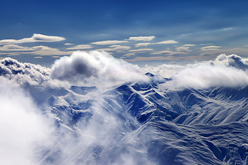 Image showing Snow mountains with clouds in evening