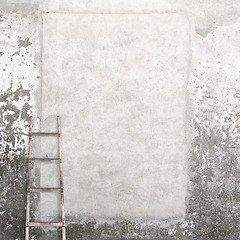 Image showing weathered wall with a wooden ladder