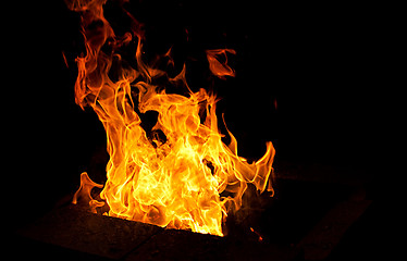 Image showing big flame on dark background