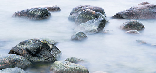 Image showing Marine stones washed by a wave, close up