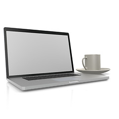 Image showing Laptop with cup