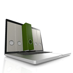 Image showing Laptop with green folder