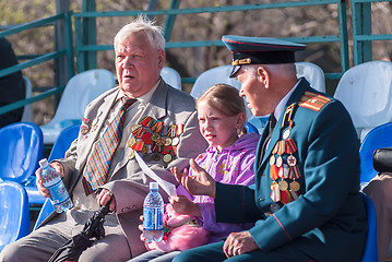 Image showing Senior veterans of World War II on tribune