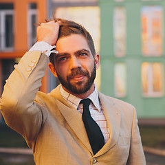 Image showing young man posing in the street