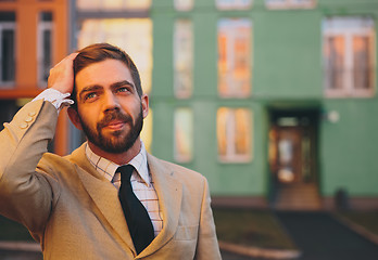 Image showing young man posing in the street