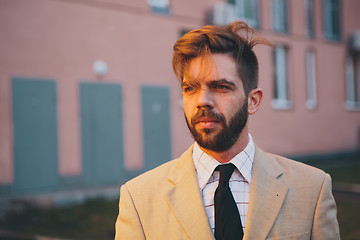 Image showing young man posing in the street