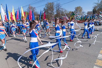 Image showing Attractive girls with gymnstics tapes on parade