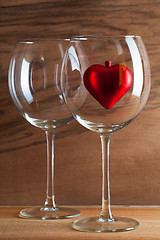 Image showing Two glasses  of wine and red heart
