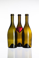 Image showing Empty bottles of wine and love symbol