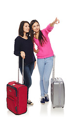 Image showing Two friends girls with travel suitcases