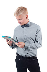 Image showing Young man using digital tablet 