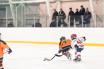 Image showing Game of children ice-hockey teams