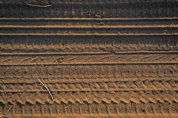 Image showing Dry soil background in warm colors