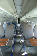 Image showing Interior of an airplane with many seats