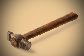 Image showing old metal hammer with wooden handle