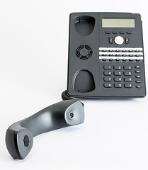 Image showing voip phone isolated on grey background
