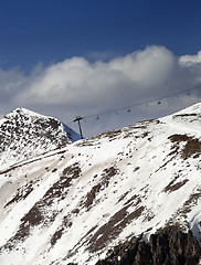 Image showing Off-piste slope and chair-lift in little snow year
