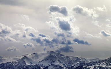 Image showing Evening mountains and sunlight cloudy sky