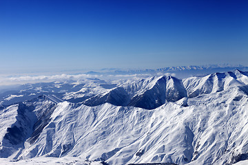 Image showing Winter snowy mountains in sun morning