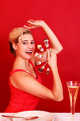 Image showing Happy Woman Posing with a Fan of Fork