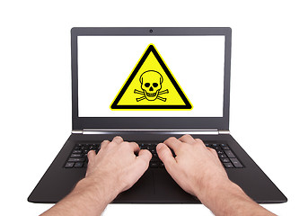 Image showing Man working on laptop, toxic