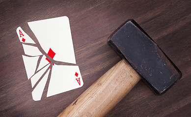 Image showing Hammer with a broken card, ace of diamonds