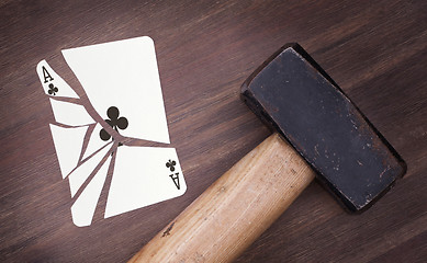 Image showing Hammer with a broken card, ace of clubs