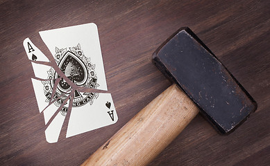 Image showing Hammer with a broken card, ace of spades